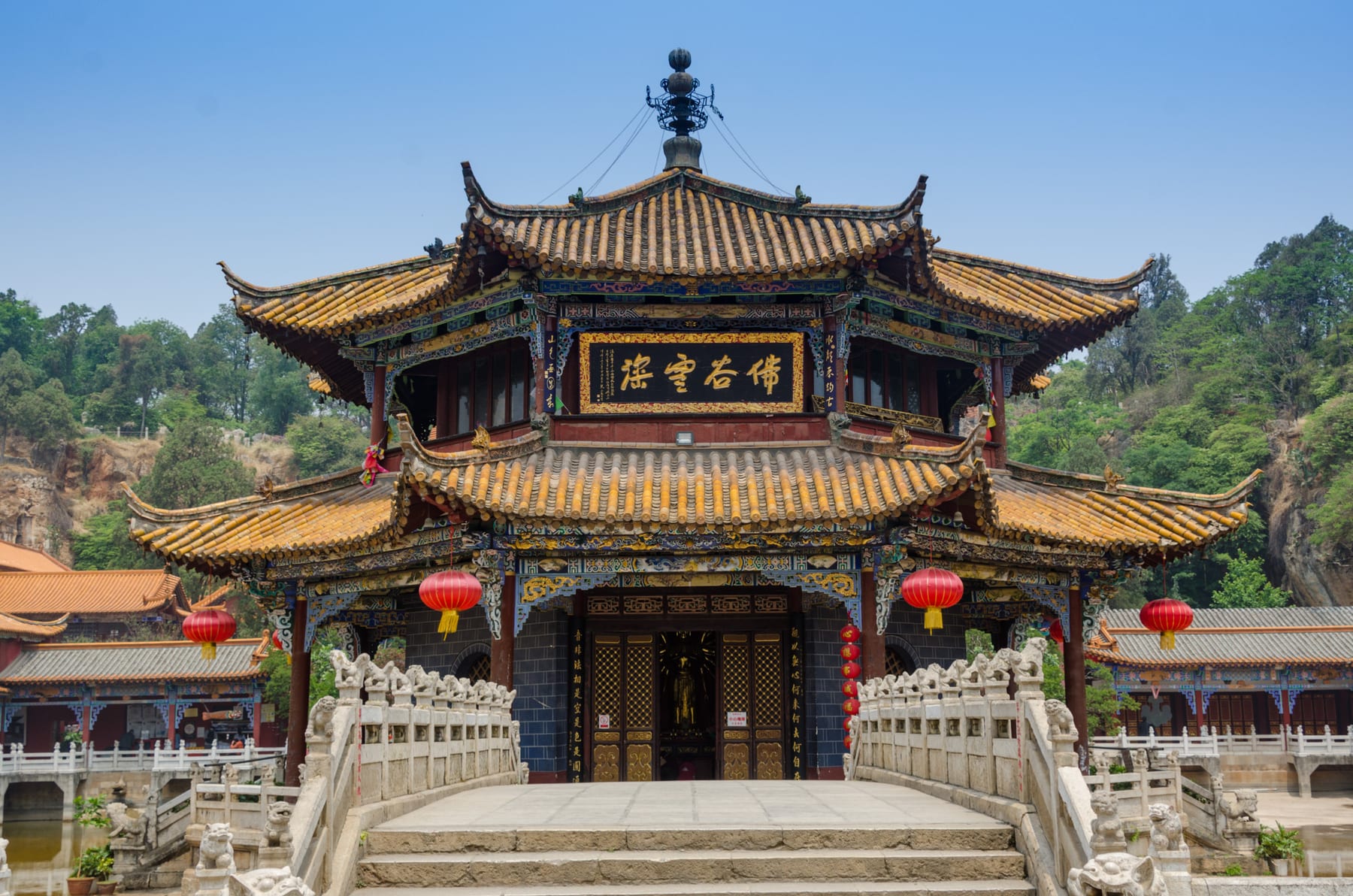 The octagonal pavilion in the pond at the centre of Yuantong Temple, Kunming, reached by stone bridges