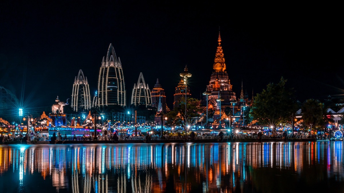 Dai stilt houses in tropical rainforest along the Mekong in Xishuangbanna, Yunnan