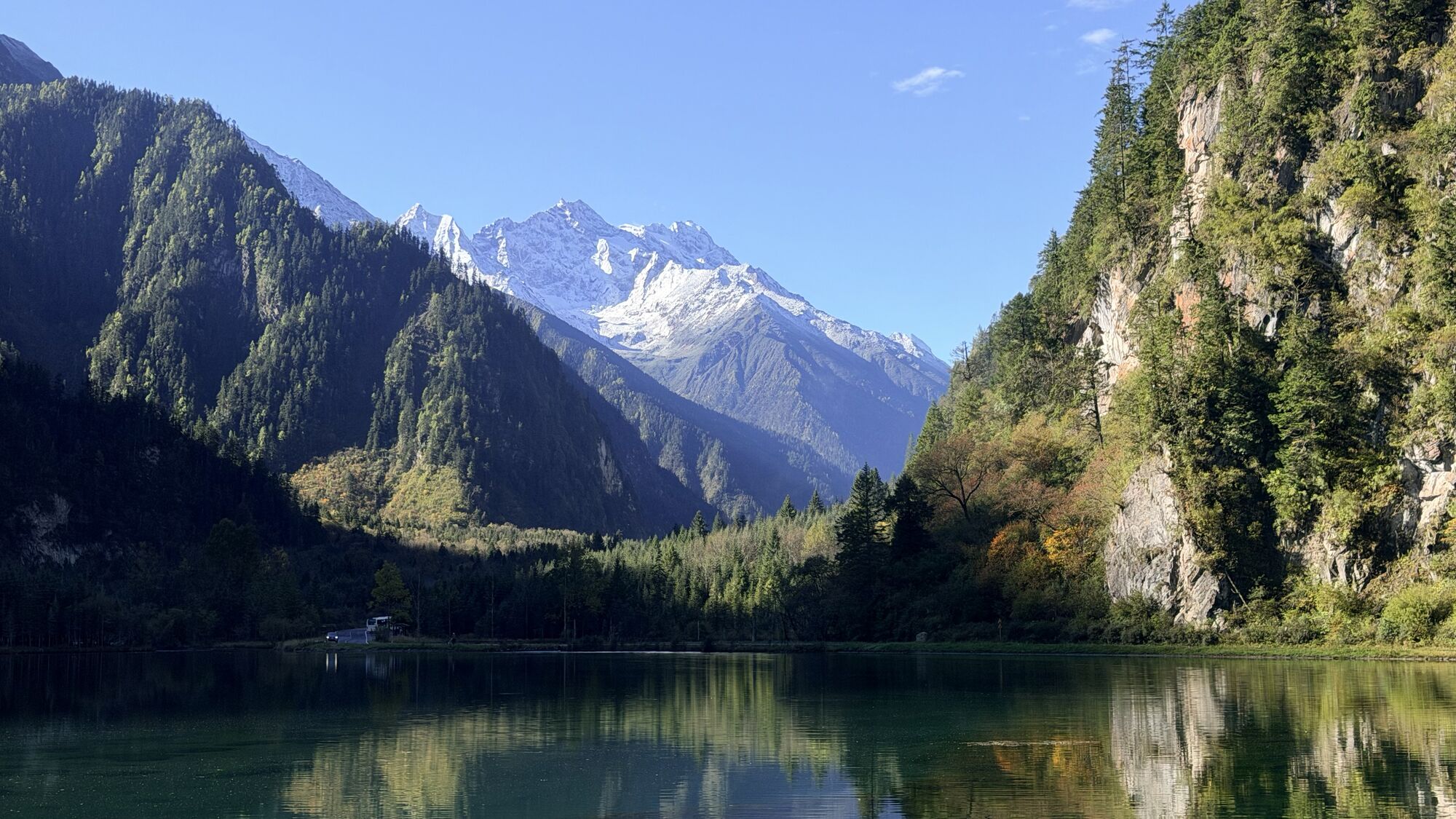 Bipeng Valley entrance with snow-capped peaks — Day 4 exit