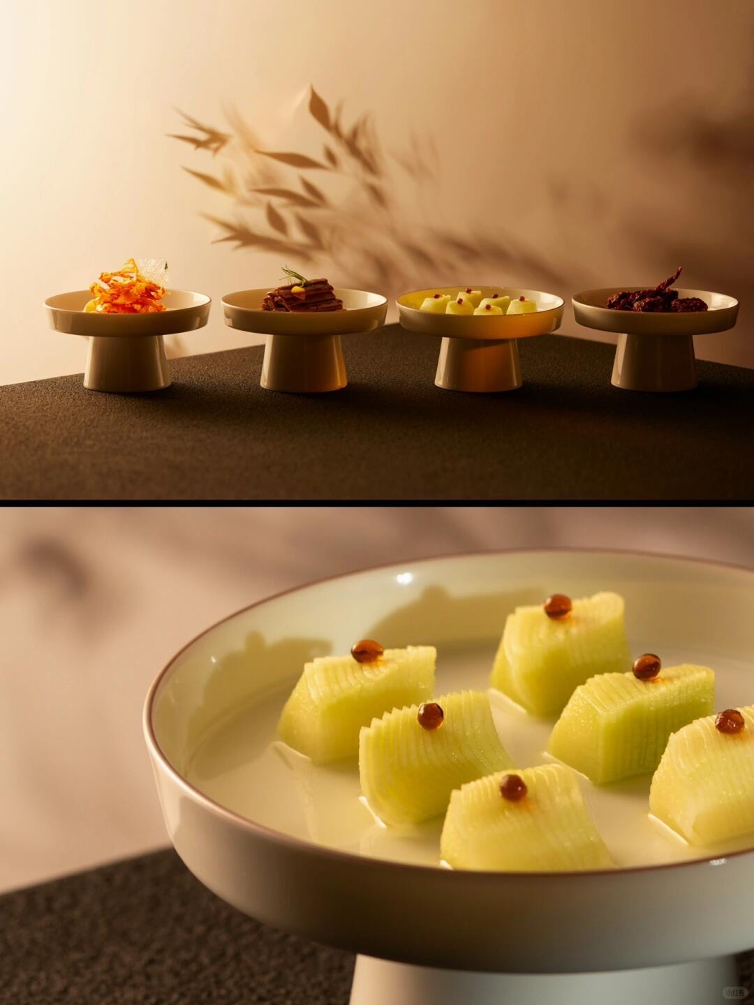 Elegant plated Sichuan tasting courses on pale pedestal dishes above a bowl of sliced melon dotted with sauce in Chengdu.