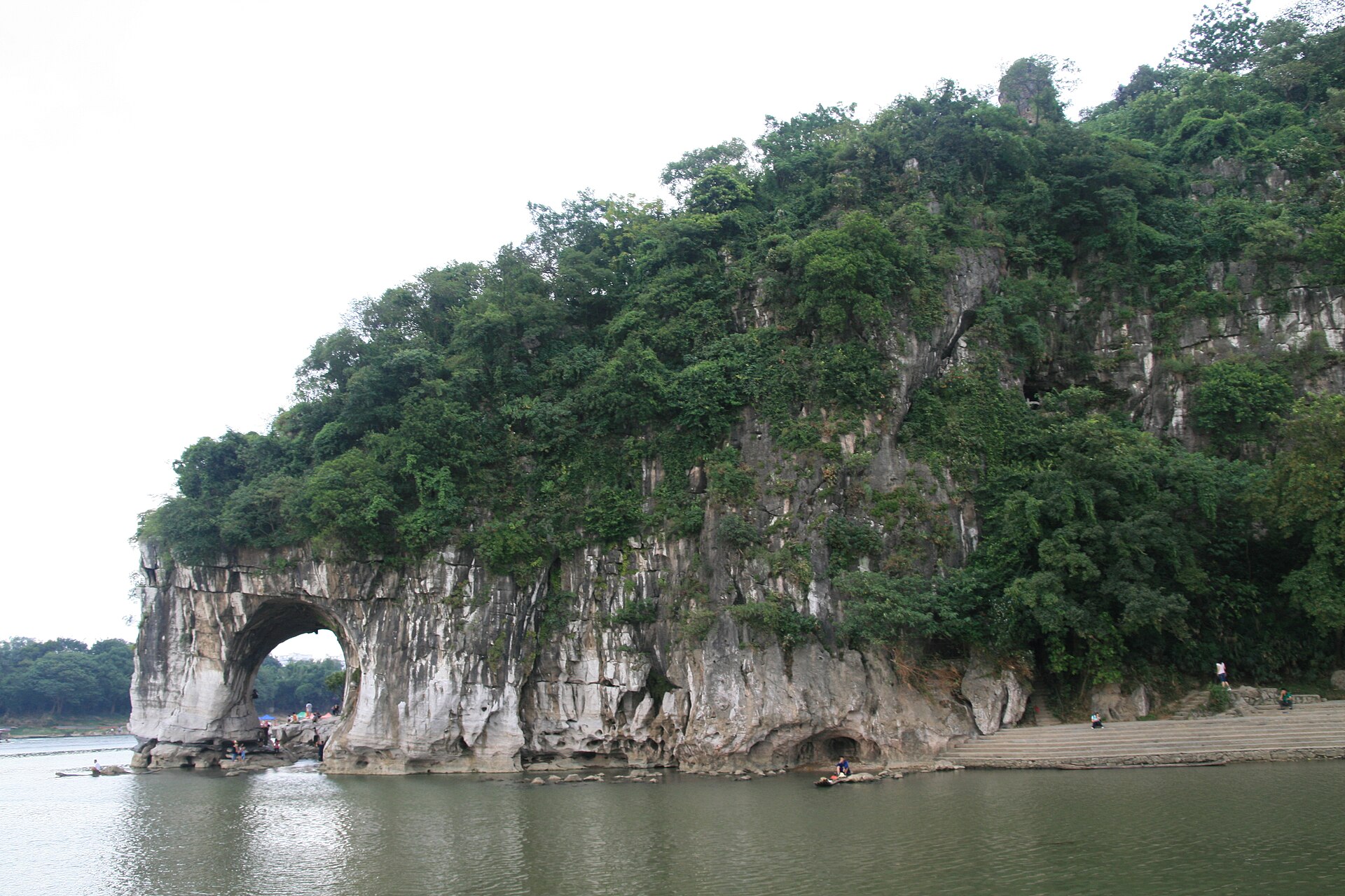 Elephant Trunk Hill (象鼻山), its limestone arch dipping like a trunk into the Li River, Guilin