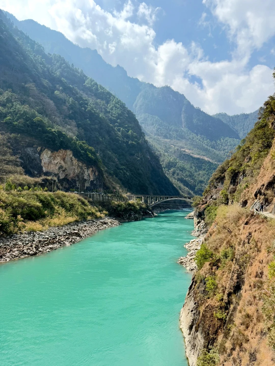 Suspension bridge across the turquoise Nujiang on the Degong frontier road — China's Last Frontier loop