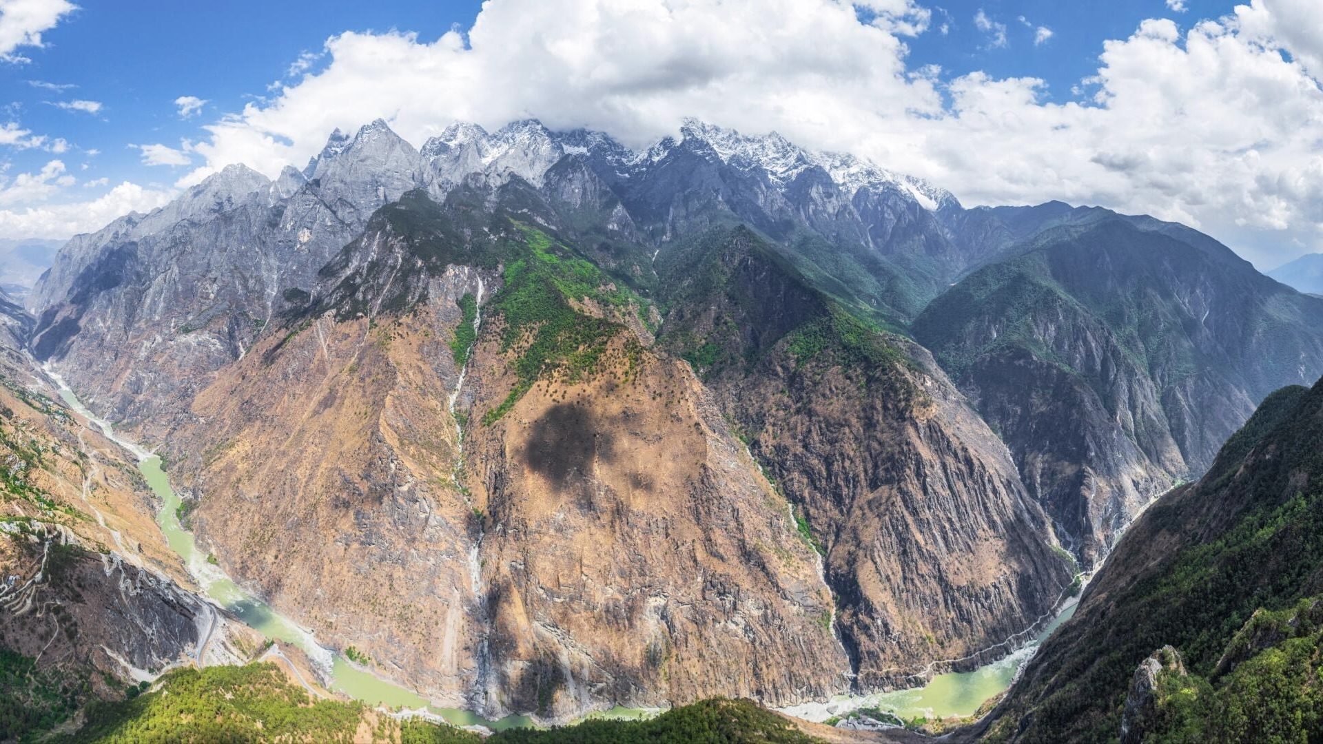 Aerial view of Tiger Leaping Gorge with the Yangtze River cutting between sheer 3,000m walls — China's Last Frontier loop