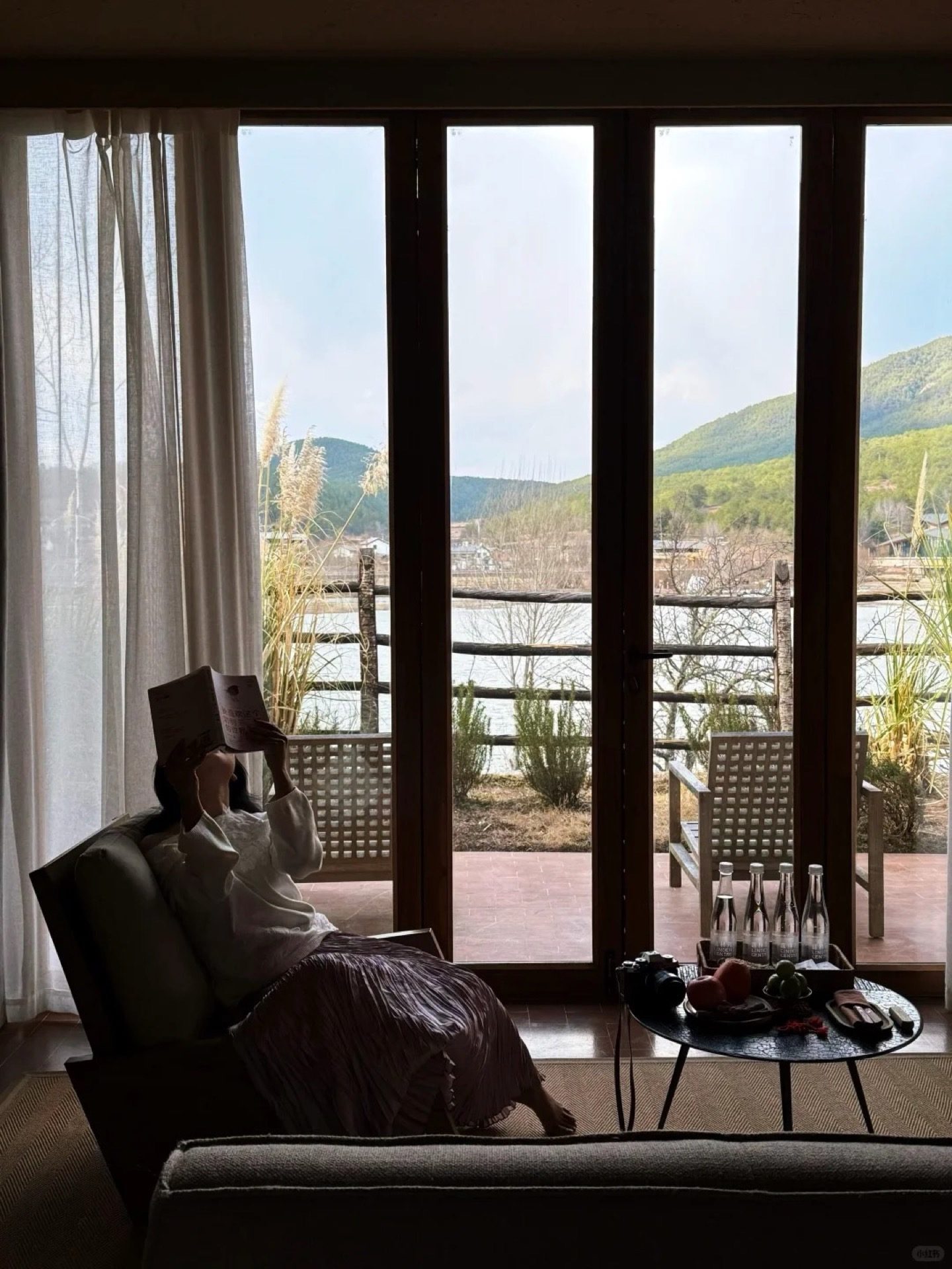 Room view at the Linden Centre Shaxi looking out over the Tea Horse Road valley — boutique courtyard stay in a restored Bai building