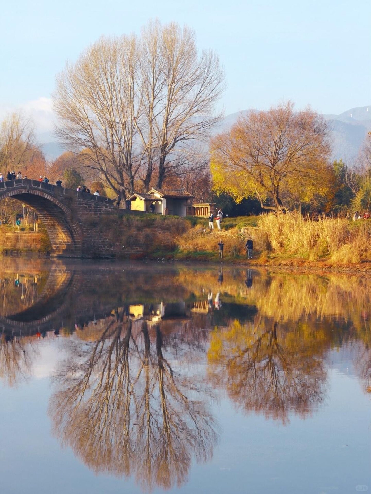 Winter landscape across the Shaxi valley with bare trees and frost over the Tea Horse Road countryside