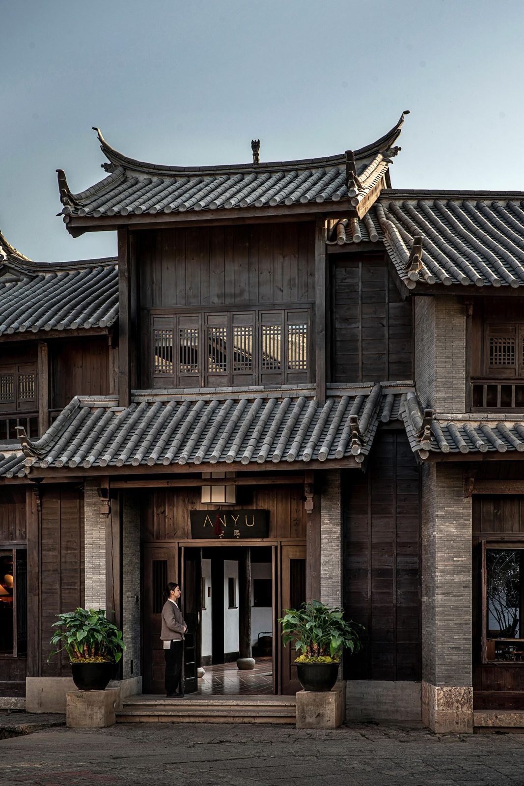 ANYU Hotel's timber Naxi gatehouse at the south gate of Lijiang Old Town