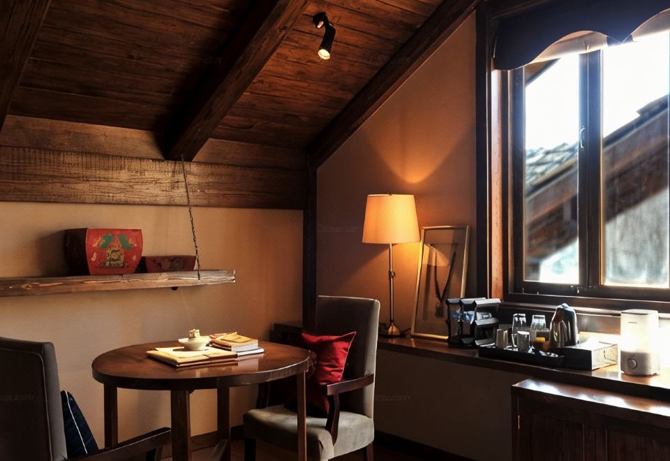 Arro Khampa — guest room with wooden vaulted ceiling and old-town window, Shangri-La