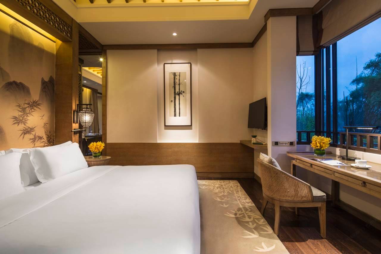Banyan Tree Yangshuo — guest room in local Guangxi style with contemporary interiors