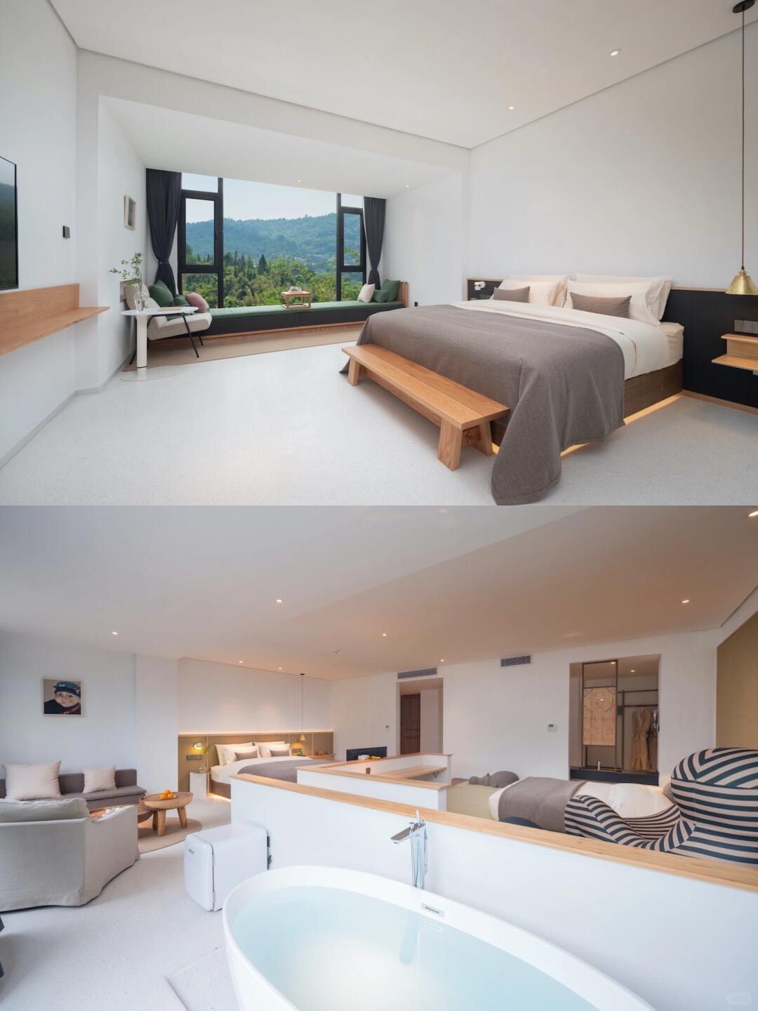 Minimalist suite with double bed, timber bench and a cushioned window seat framing a green forested hillside.