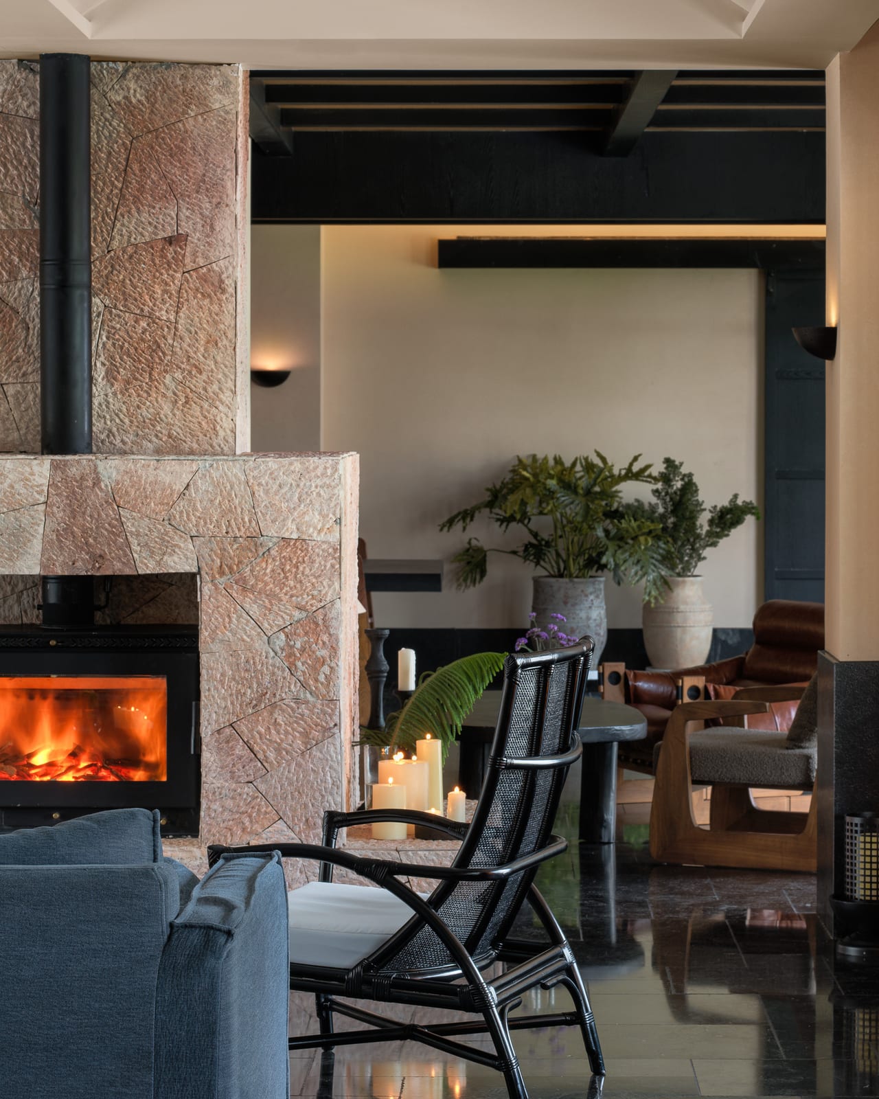 Kasion Erhai — the lobby lounge around a stone fireplace