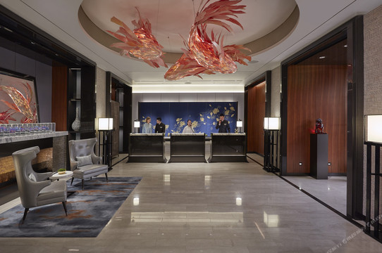 Mandarin Oriental Wangfujing, Beijing — the lobby beneath a hovering goldfish art installation