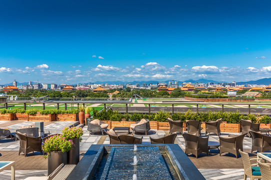 Mandarin Oriental Wangfujing, Beijing — the rooftop terrace over the Forbidden City's golden roofs