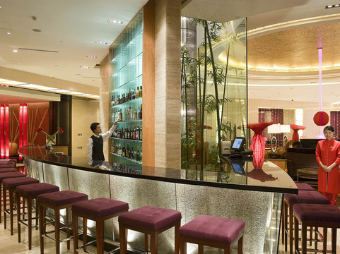Sofitel Xi'an on Renmin Square — the lobby bar with windows onto the gardens