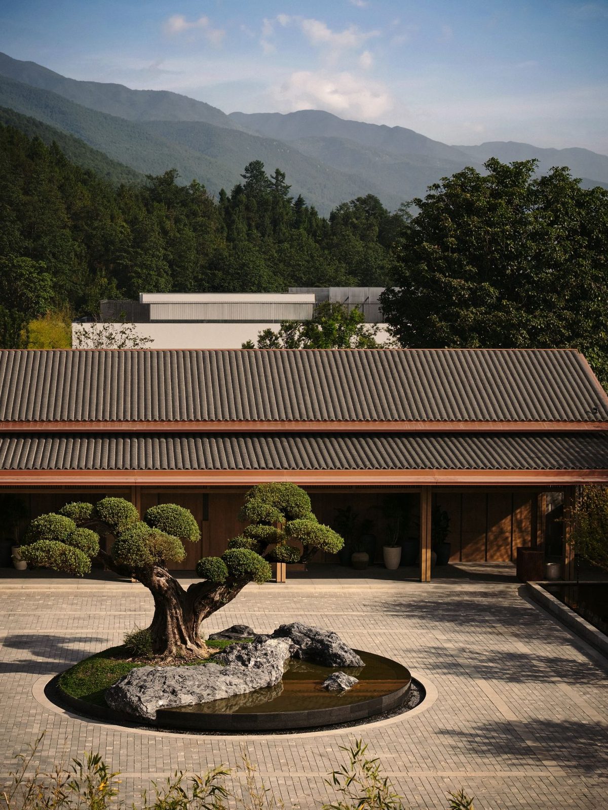 Pine courtyard and tiled pavilion at The Dali EDITION