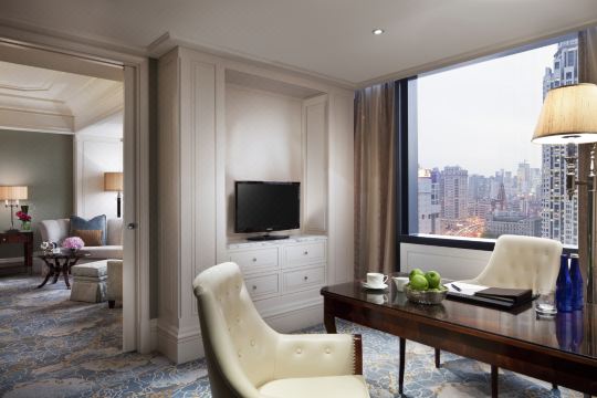 Waldorf Astoria Shanghai — a Junior Suite living room in old-Shanghai style