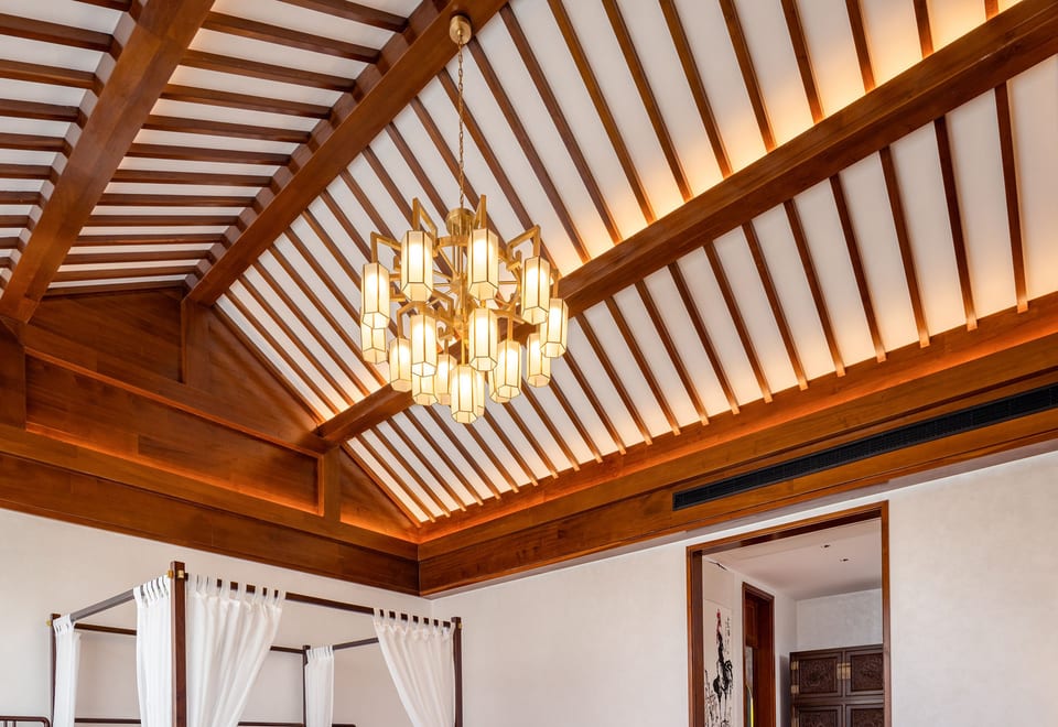 He Ting · Awamei — suite with a canopied rosewood bed