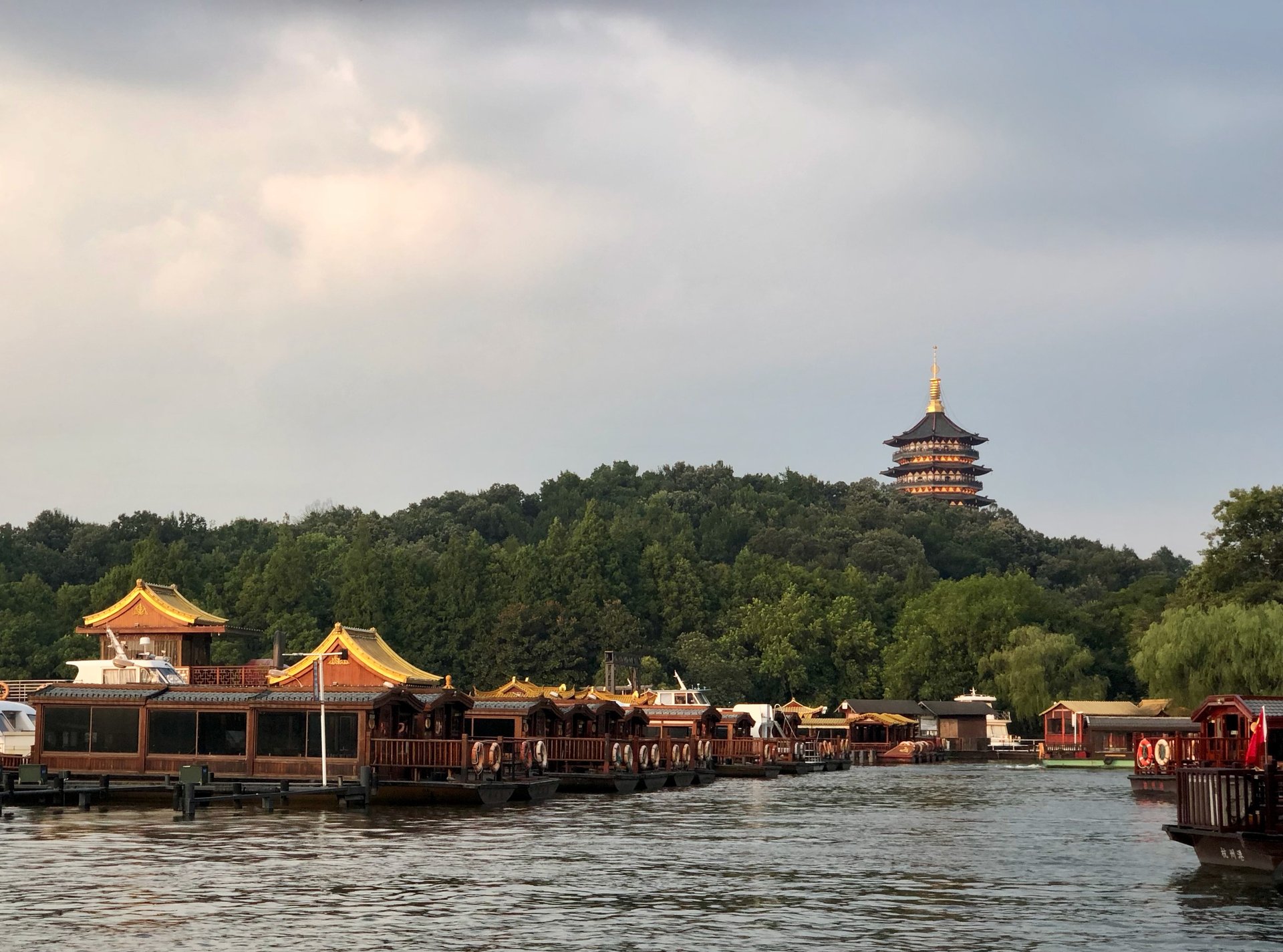 Leifeng Pagoda above the moored boats of West Lake