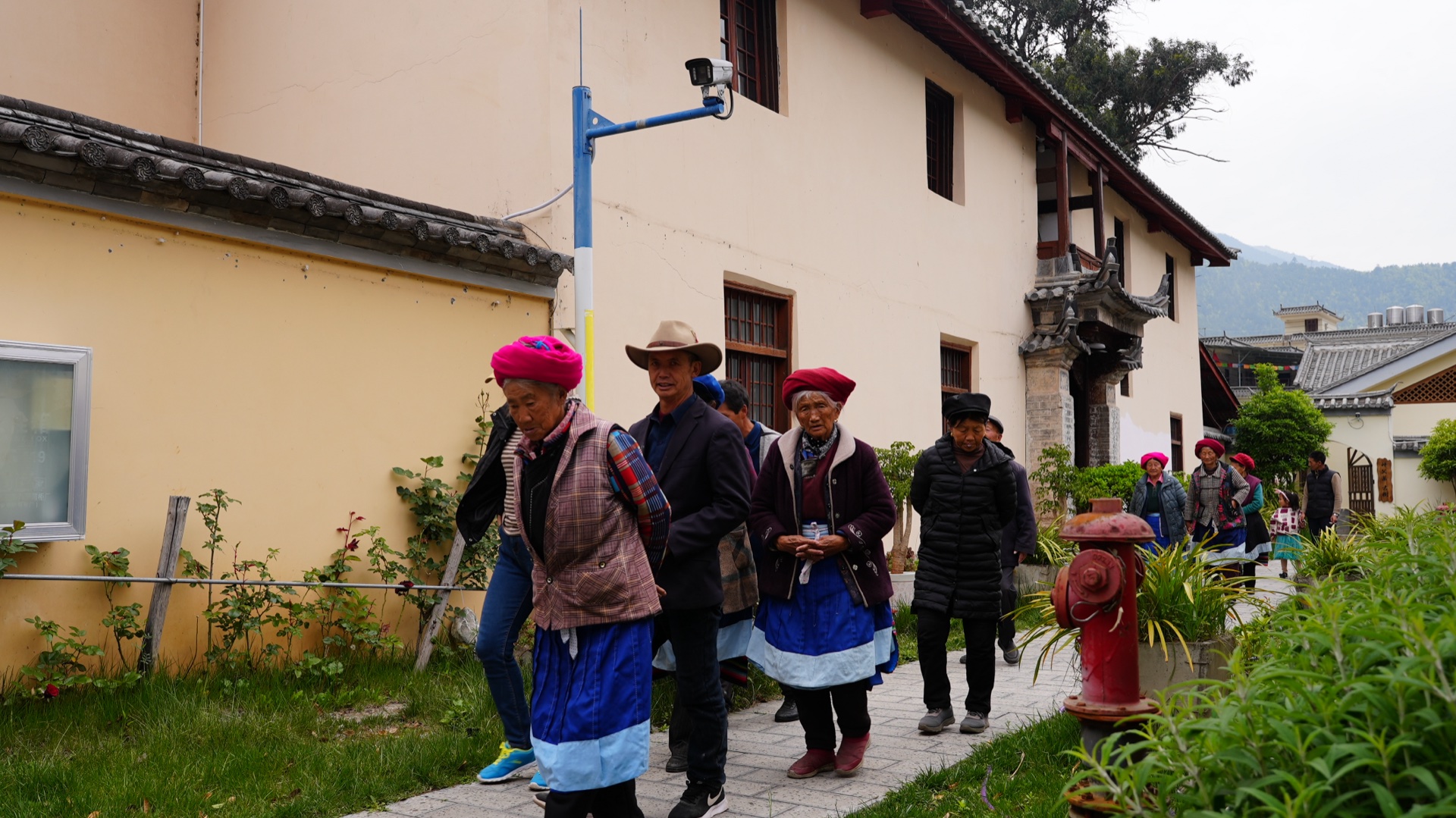 Villagers in Tibetan dress at Cizhong