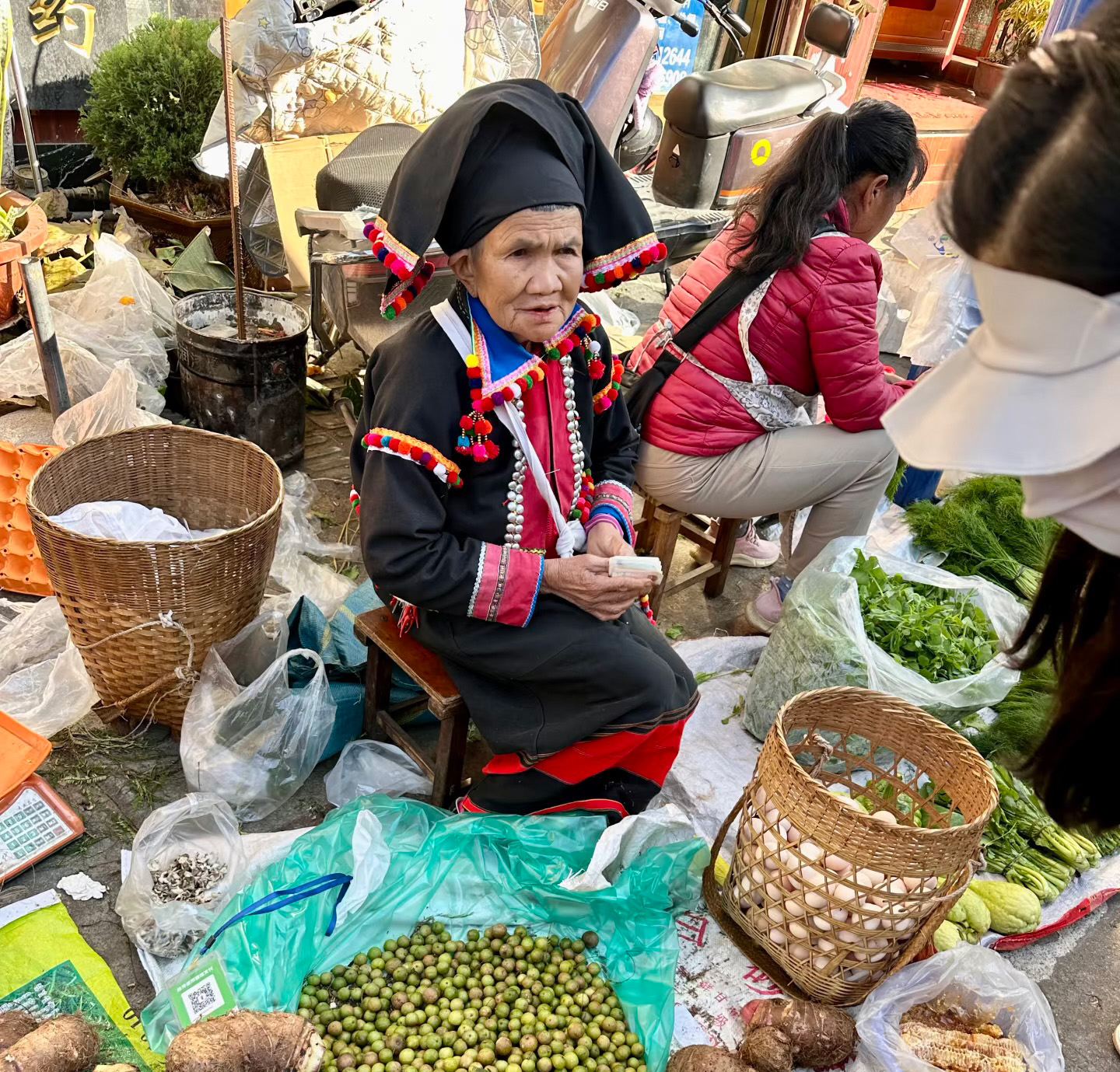 A local market seller in Dehong